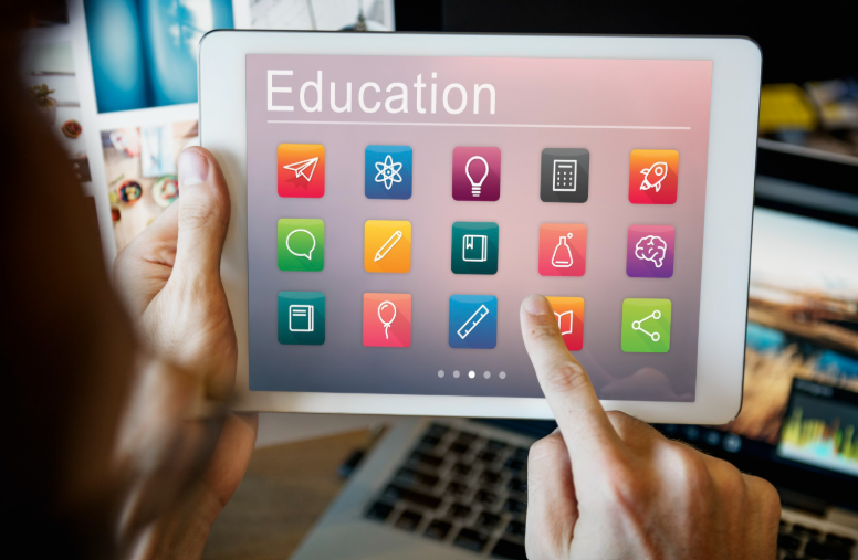 student using the educationbeing com platform on a tablet with an interactive learning interface displayed